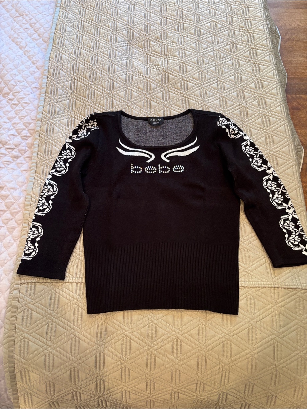 bebe Black Sweater with White Embellished Logo and Sleeve Motif